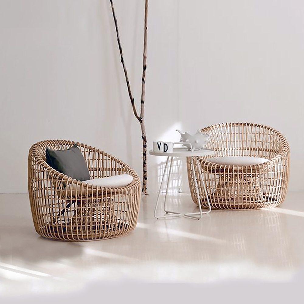 Austin rattan outdoor bucket chair with cushioned wooden nest; A clearance sale